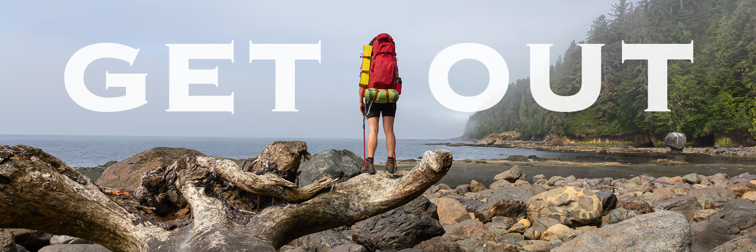 A hiker exploring the Olympic Peninsula coastline near Kalaloch Lodge