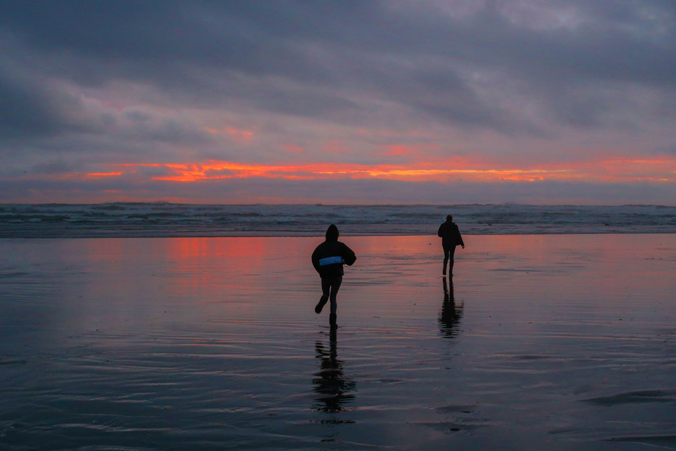 A couple of Kalaloch guests running off into the sunset